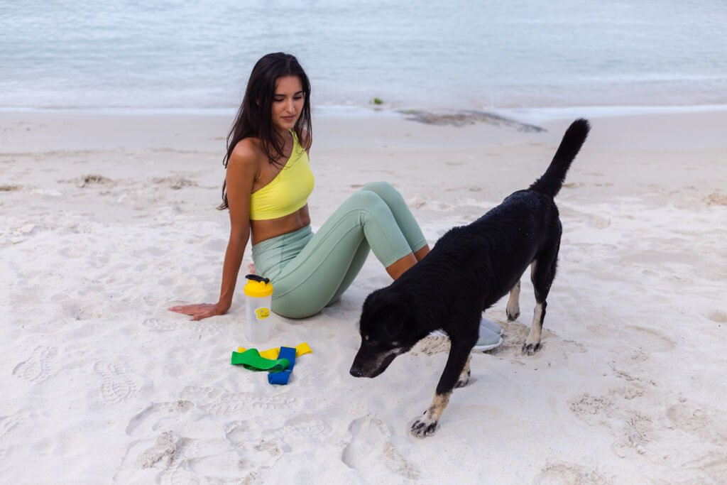 image of a happy dog and youg lady